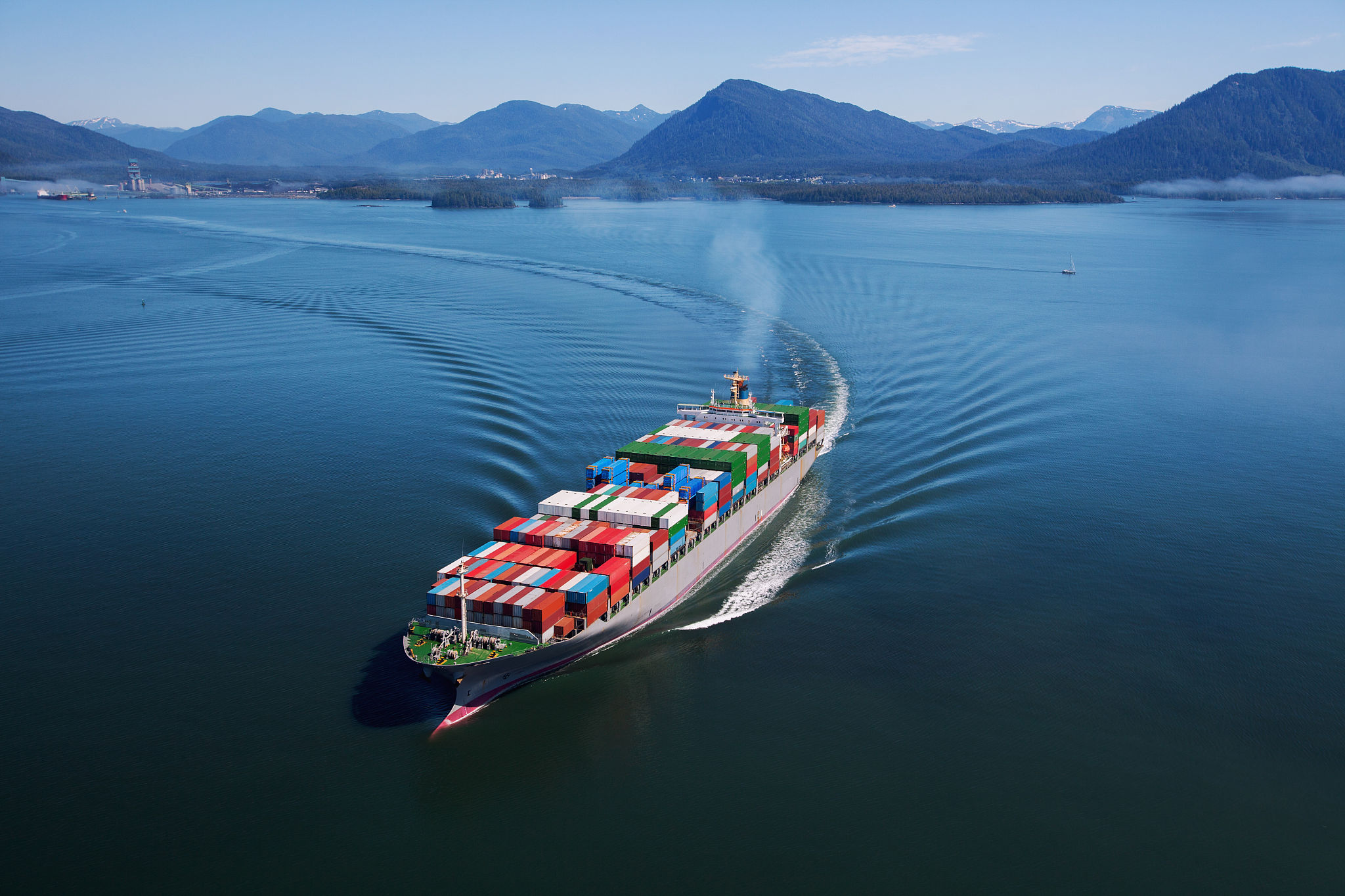 Cargo ship and airplane representing multi-modal transport options